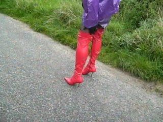 Men out and about in red thigh boots