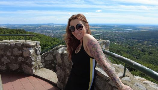 Tattooed Mom is hiking in the woods. She enjoys summer and outdoor nudity