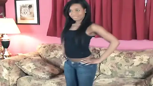 Seductive Ebony Babe Strips Naked on Couch Teasing Pussy