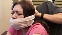 Bound and tape gagged slut gets fucked on the table