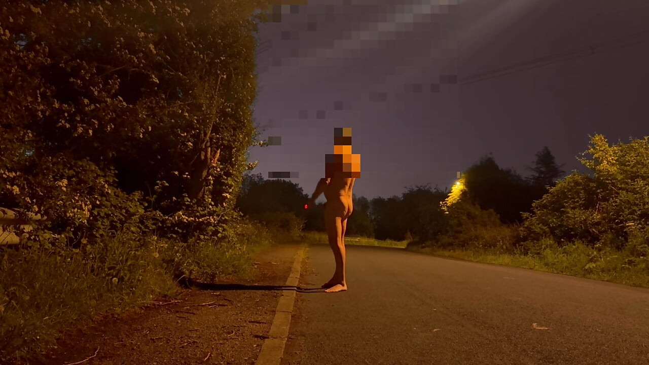 Barefoot nude in road