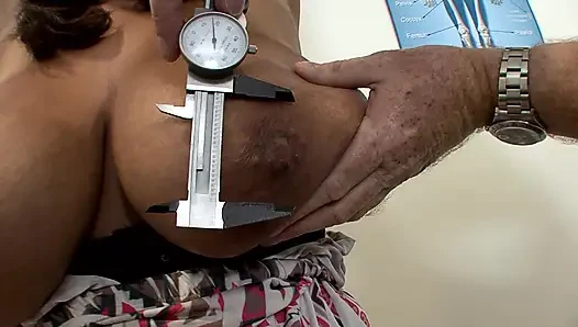 Busty Brunette's Steamy Doctor Exam