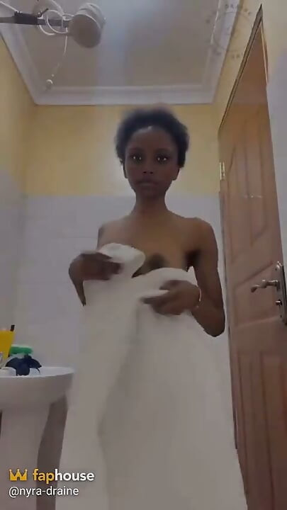 African Teen Taking a Shower at Home