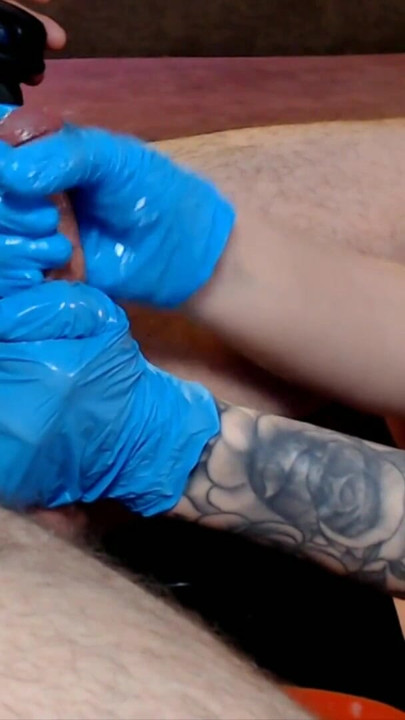 A hot cosmetologist delightfully massages a client's penis and brings him to a double cumshot. | Clip 2
