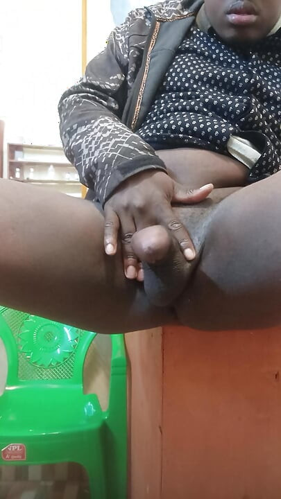 Horny black man stroking his dick at work and shooting big load