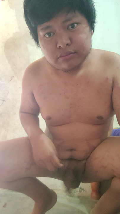 Masturbating
