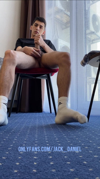 Captivating moment from "A GUY WITH HAIRY LEGS IN WHITE SOCKS ADIDAS JERKS OFF A DICK"