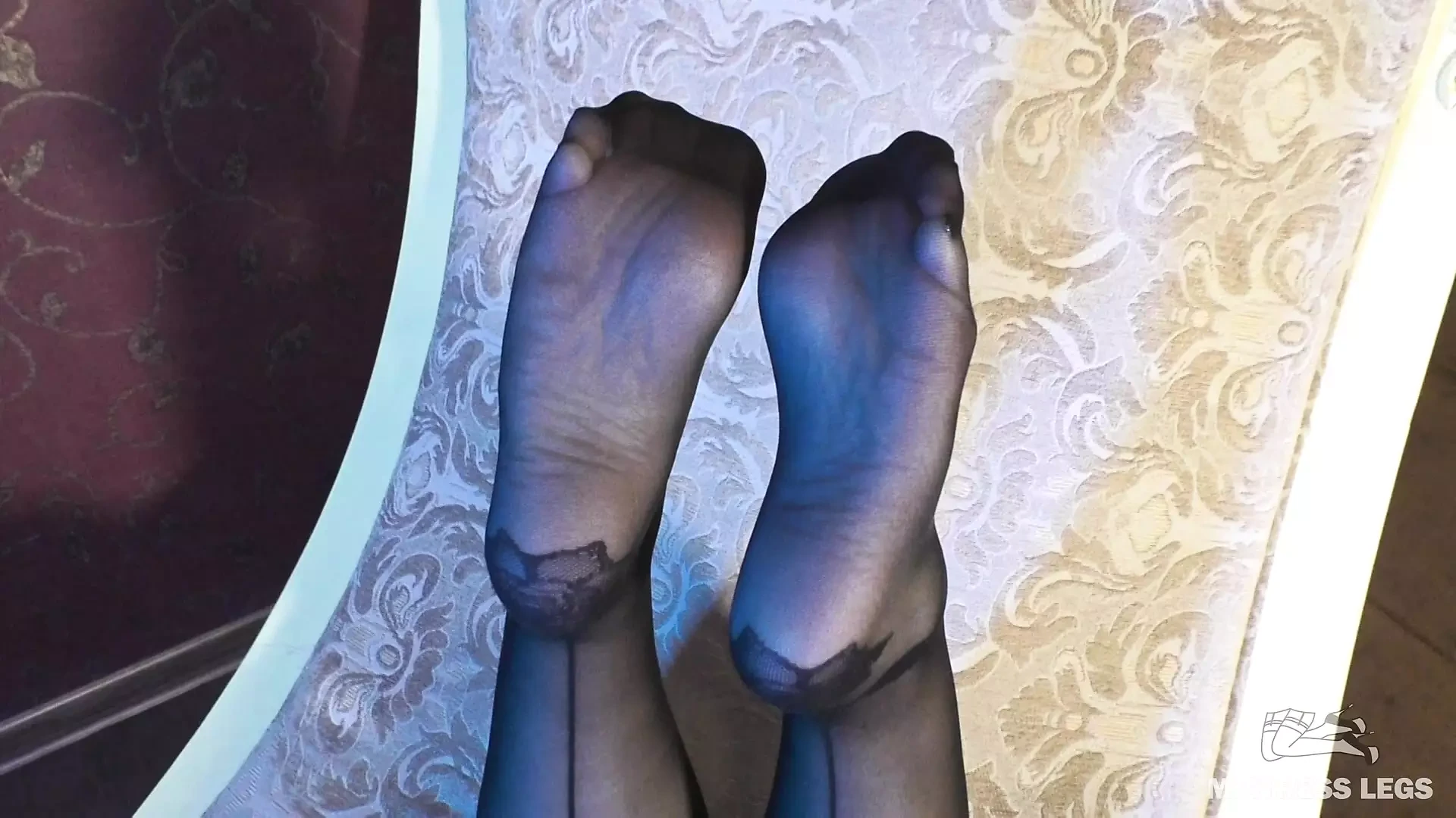 Sexy Goddess in Black Pantyhose with Rose Print on Heels Teases You with Her Feet