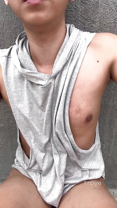 Cute Asian takes a morning walk at the park and masturbates