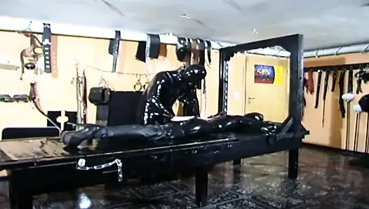 Bdsm with masked girl in latex