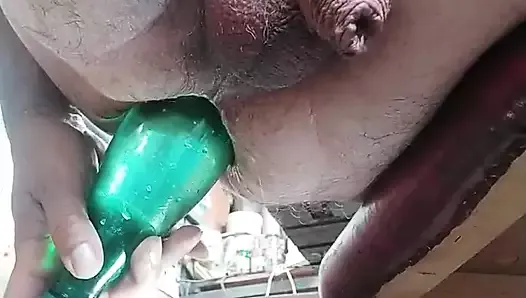 Cumming with the green bottle