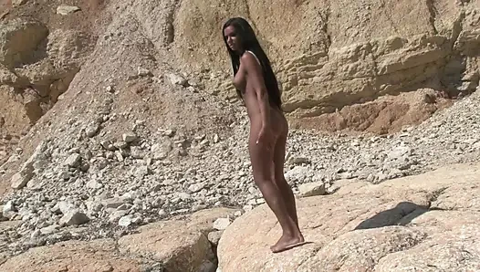 Perfect tanned babe undressing