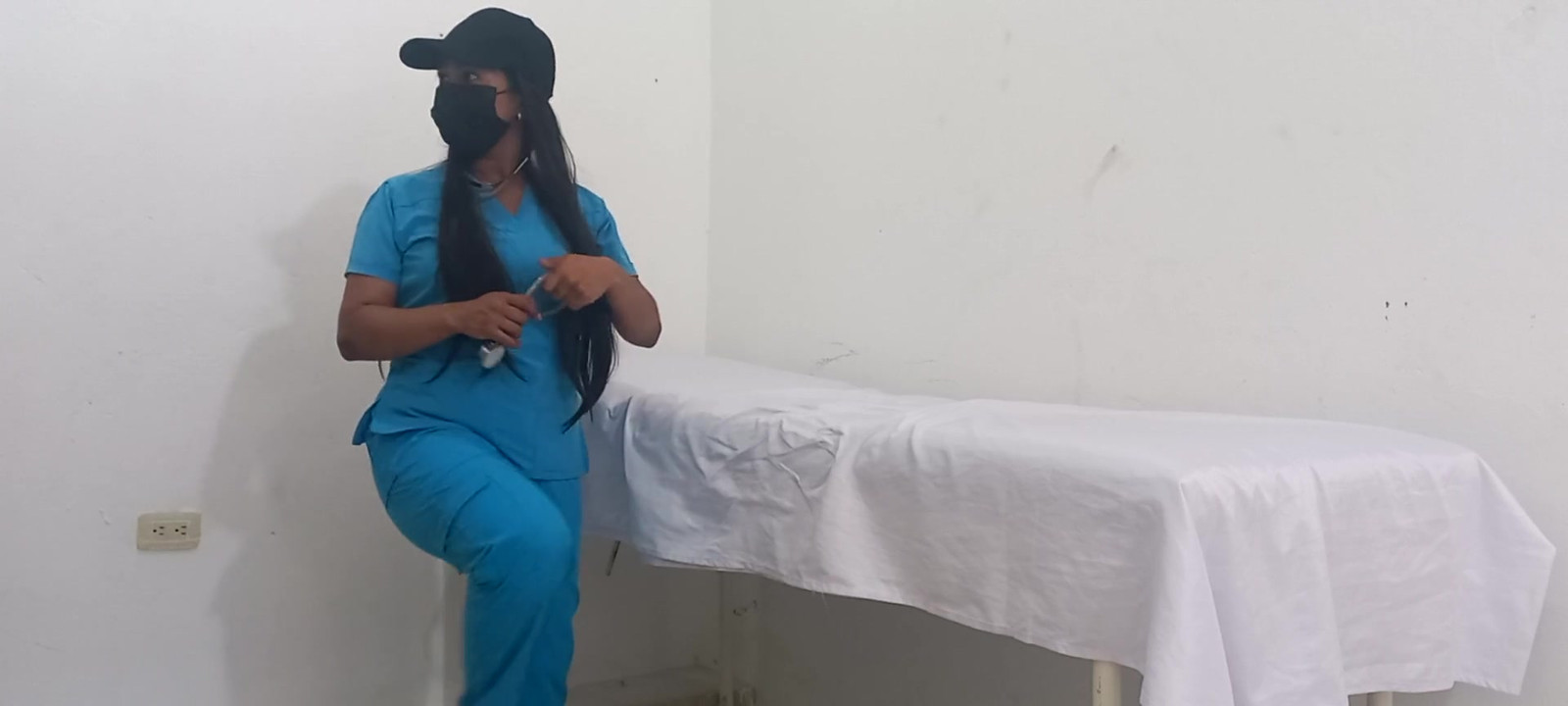 My nurse massages her pussy and moans with pleasure in her office