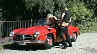 Fuck by a red Mercedes Benz