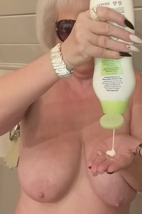 Hot Granny Fucks Her Standing Dildo in the Bathroom