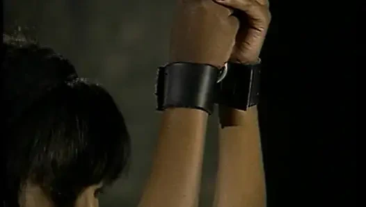 Big boobed ebony goddess dominates two slutty chicks in the dungeon