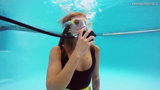 A perfect brunette babe Katya Nakolkina underwater