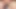 Japon adam yerde otururken masajla mastürbasyon yapıyor.