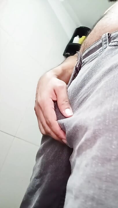 Urinating in Dark Jeans