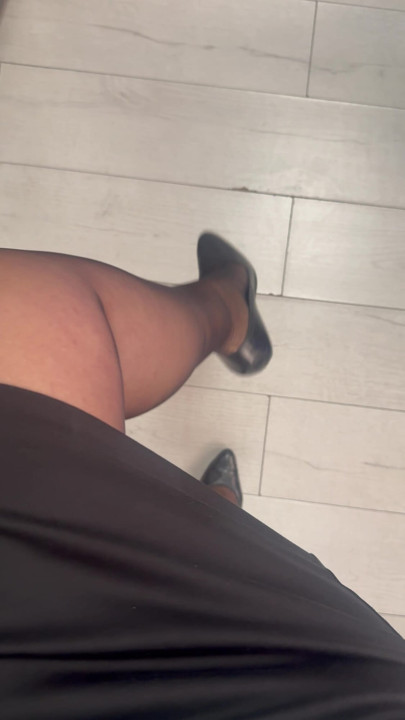 Wife teasing in nylons, high heels and short skirt