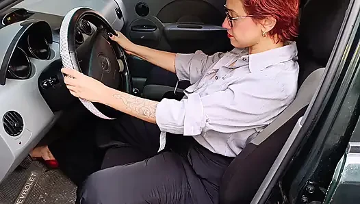 Secretary gets aroused in her car pedaling and ends up with a big squirt by masturbation