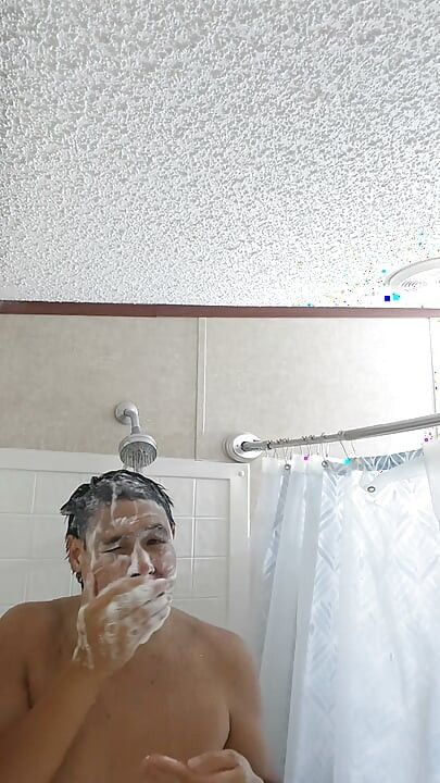 Cleaning Up in the Tub Bathing Solo and Rinsing Off