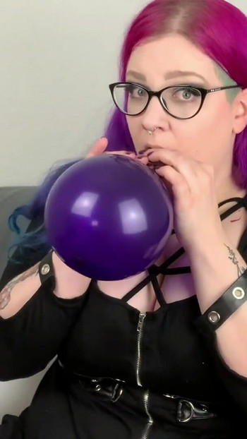 Iconic moment from "Balloon : Blow to Pop with German Goth Abby Strange - Looner"