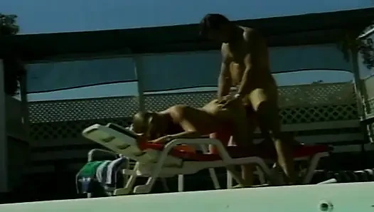 Facial cumshot for a hot blonde babe by the pool
