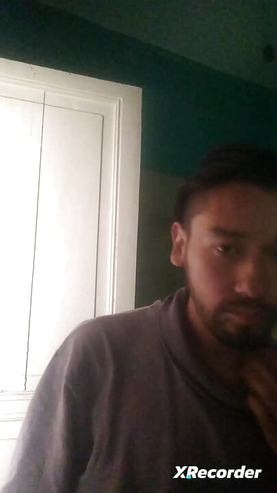 Man does his skincare in the morning
