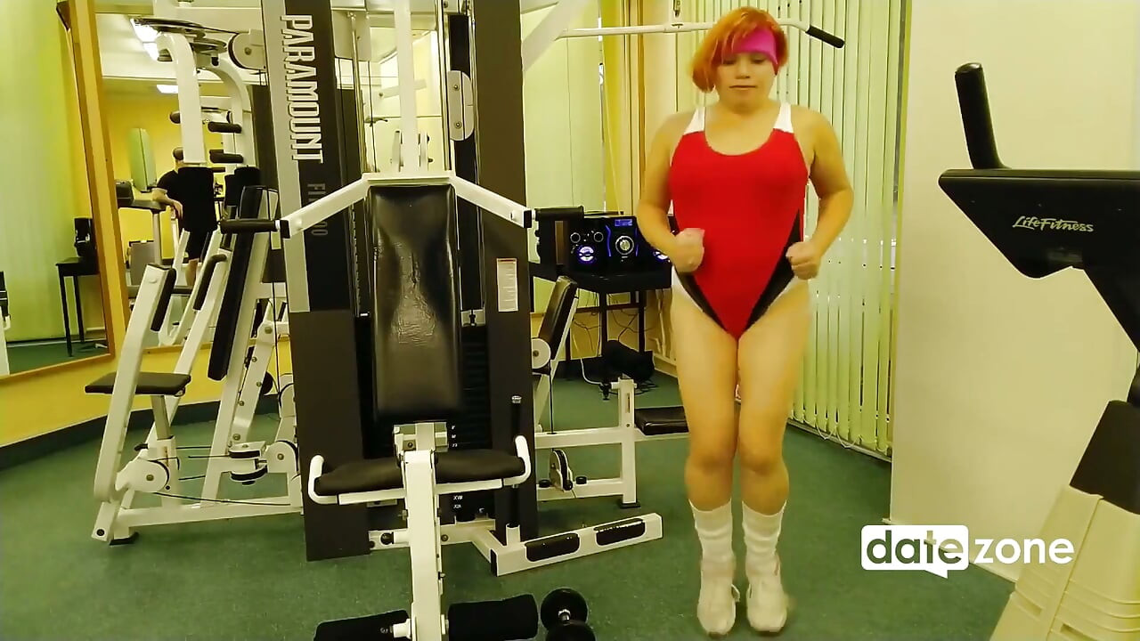 Handsome coach fucks redhead mature slut in the gym
