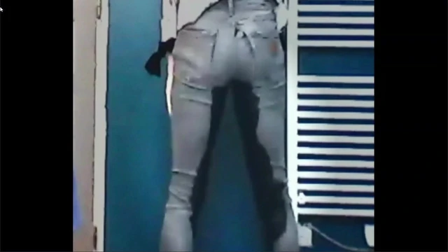 Emma pissing in tight jeans