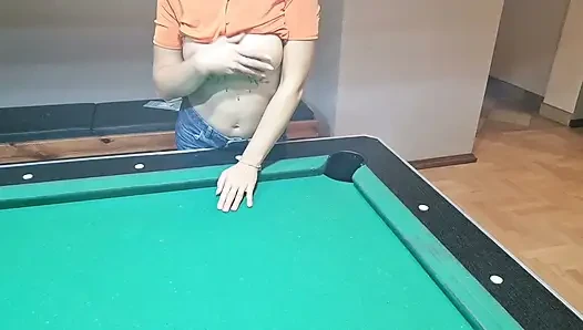 publicly flashing tits on a pool table.