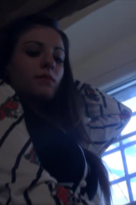 Brunette teen Bianca takes high heels off her feet