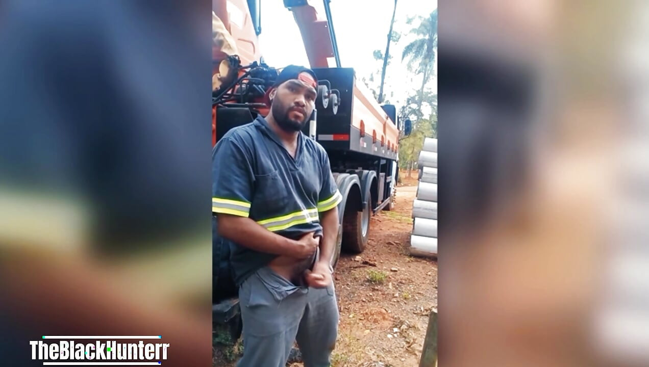 Worker Masturbating at the Construction Site Hidden Behind the Company Truck