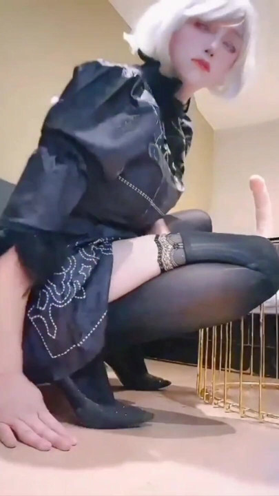2B cosplayer stimulates her fat cock while deepthroats too deeply that bursts into tears. | Clip 1