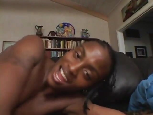 Horny ebony sits on a big white dick and fucks it hard with her pussy