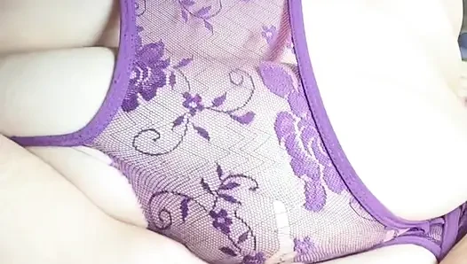 Close-up Latina in violet lingerie touching non-stop
