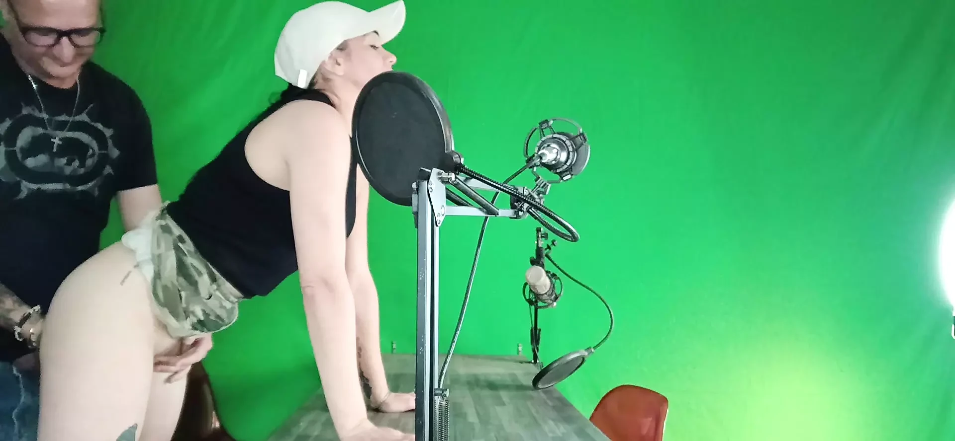 Me and my steps sit in front of the green  screen