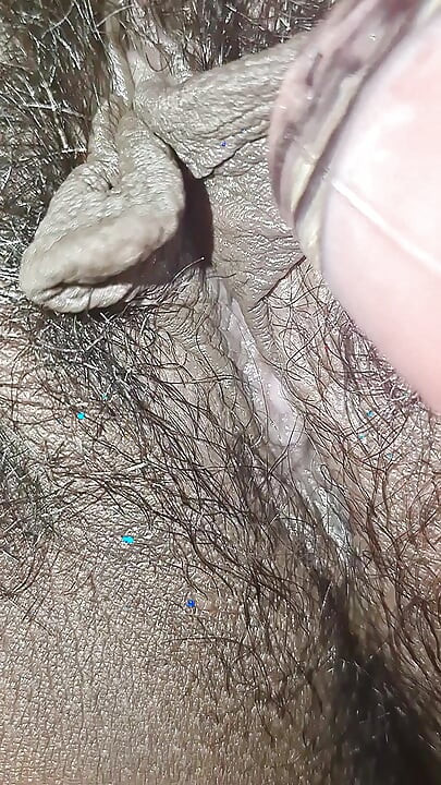 The village woman is showing her large pussy