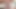 彼女は笑いながら、彼の哀れな小さなペニスを手で動かす