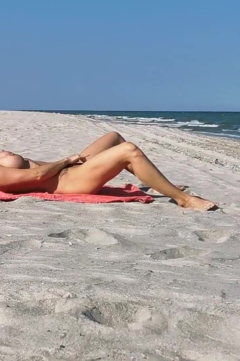 Hot MILF Masturbating on the Nudist Beach Got Caught on Camera