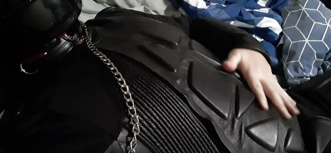 Biker cums in leather moto race suit