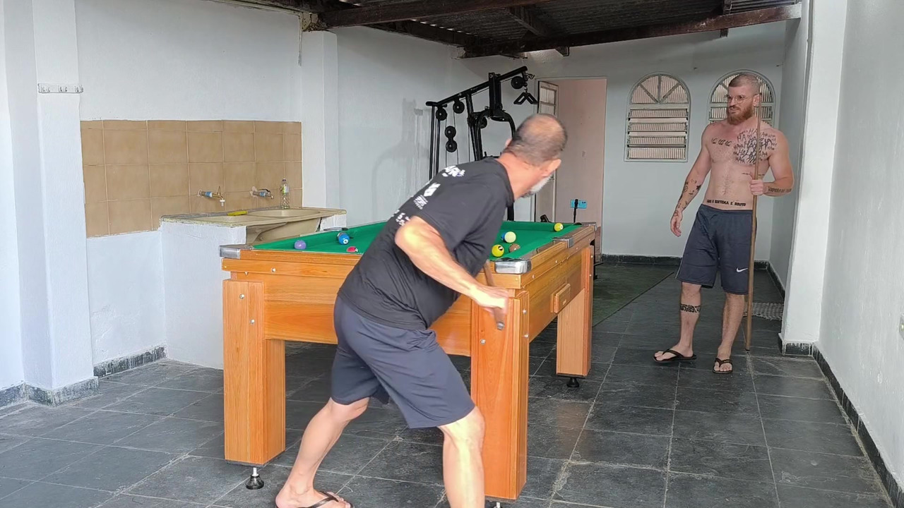 playing billiards for ass