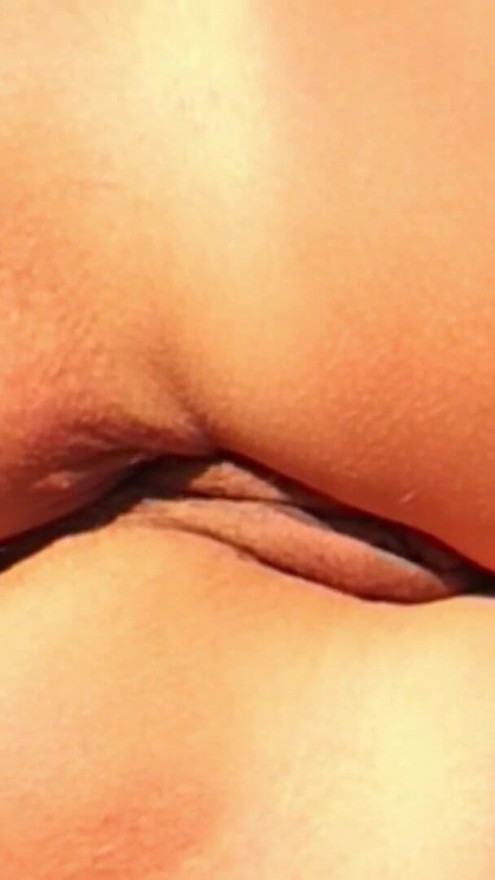 She shows her ass on the beach of Cap d'Agde and jerks off her pussy and then her boyfriend's cock with voyeurs | Clip 3
