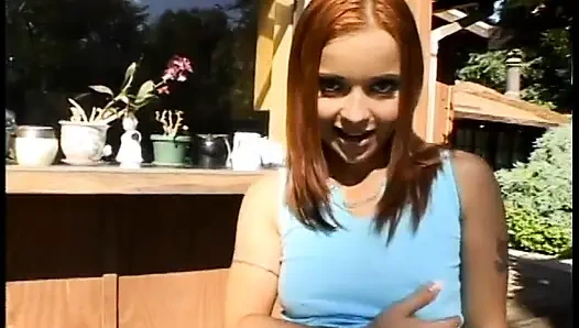 Slim young redheaded slut kneels and sucks five jizz-dripping cocks