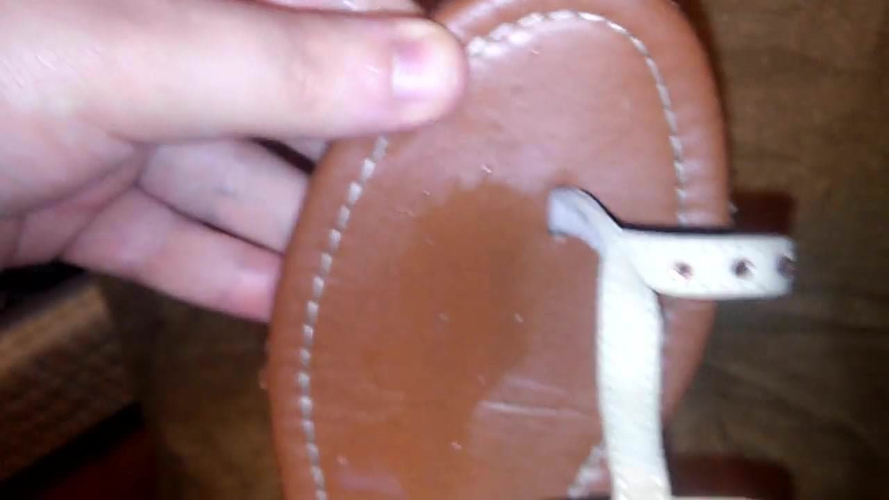 Cumming on leather sandal