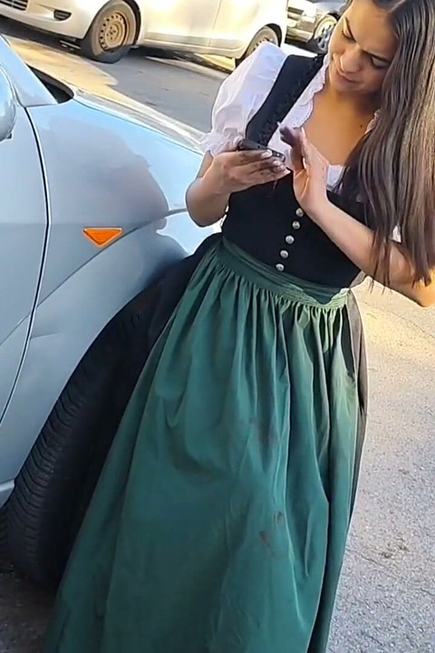 Dirndl Slut Gets Dirty and Oily Changing Tires