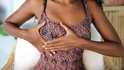 Cute black girl massages her boobs on Youtube