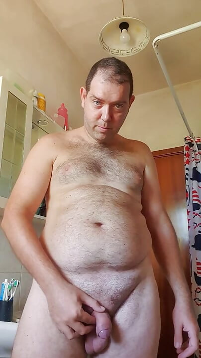 Nude boy in bathroom