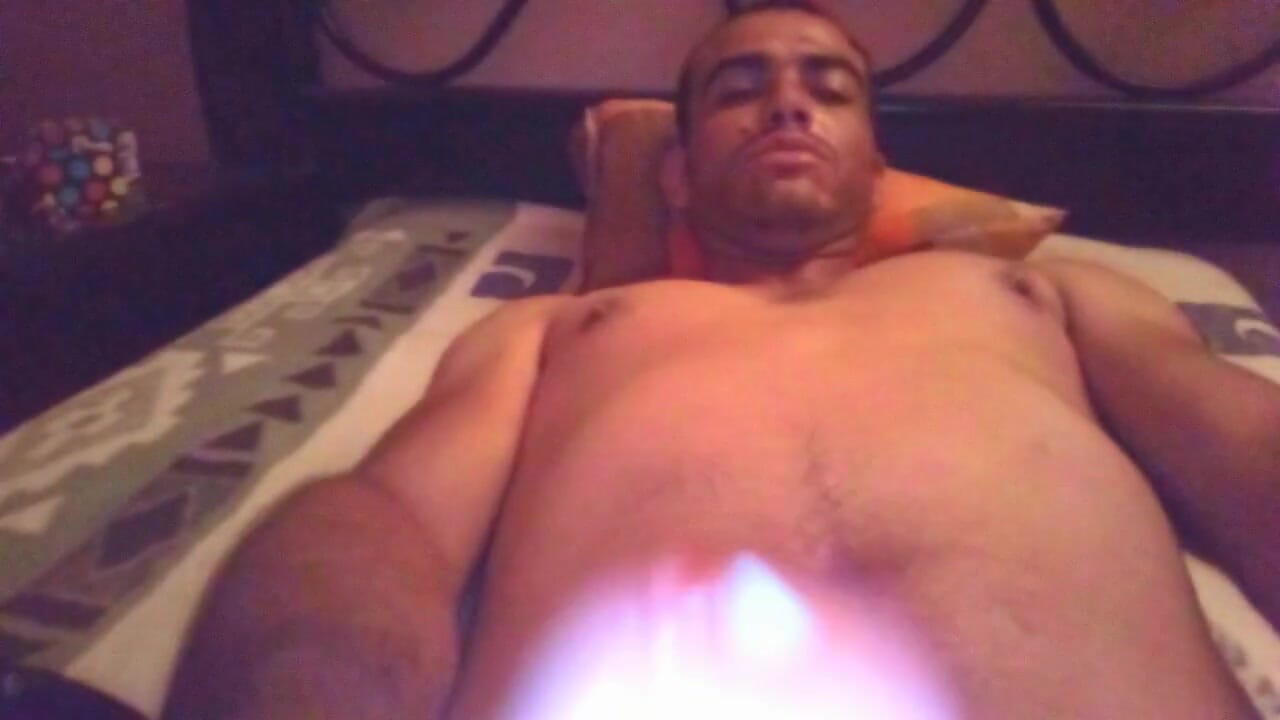 Masturbating